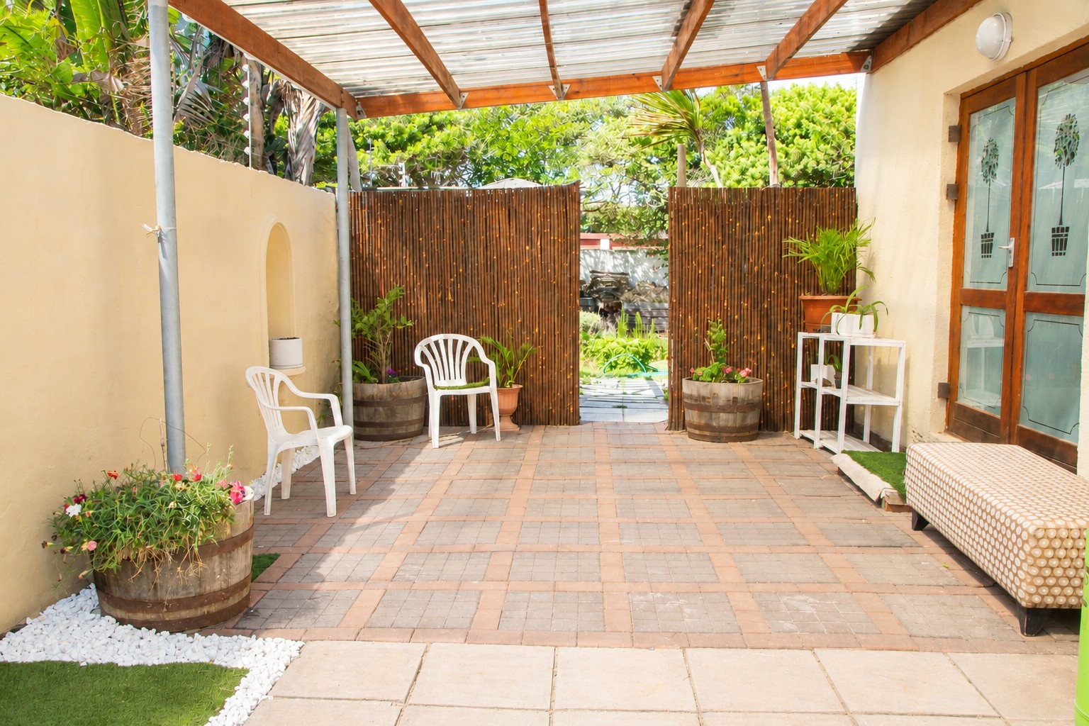 Covered patio with comfortable outdoor seating